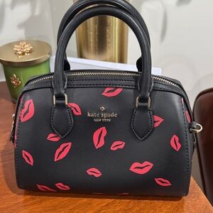 Kate Spade Black Satchel with Pink Lip Print